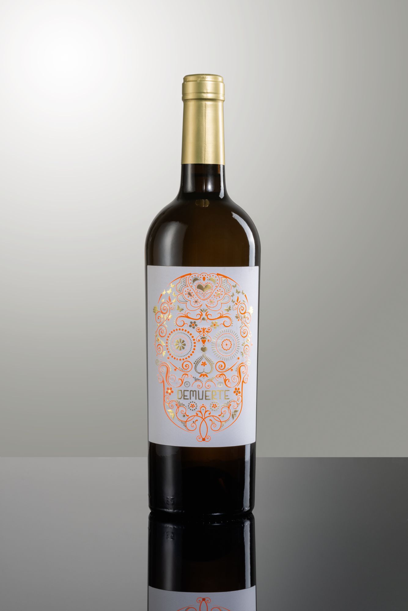 A wine bottle with foiling on its label 